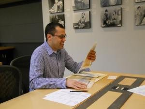 Ben West of UnsungMusicalsCo., Inc. peruses original script of Fig Leaves are Falling in the Dorothy Loudon Papers, Katharine Cornell-Guthrie McClintic Special Collections Reading Room, New York Public Library for the Performing Arts.