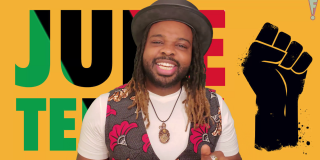 Image from a video featuring Fyütch in a gray vest and hat against a yellow background with the word Juneteenth partially obscured next to an icon of a raised black fist