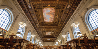 Forced perspective photo featuring the Rose Main Reading Room ceiling mural and chandeliers