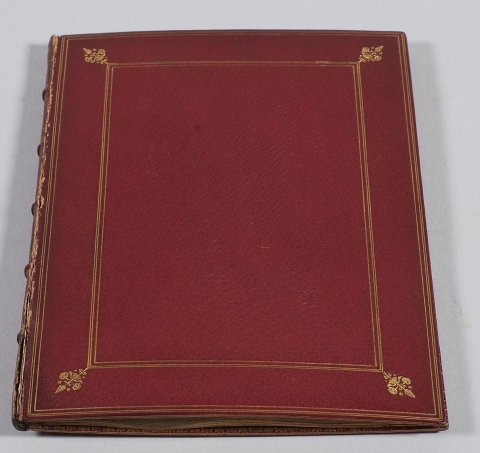 Book with nineteenth century binding of gold-tooled full red leather