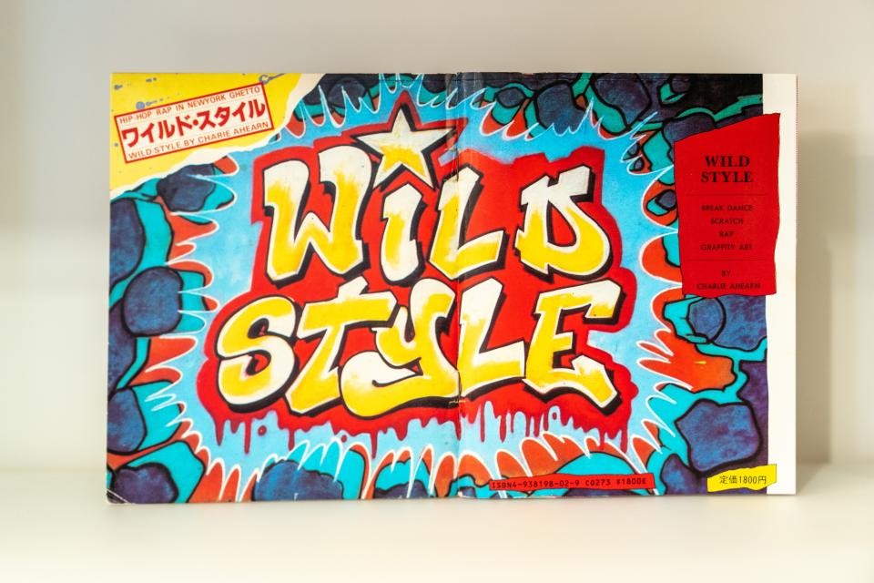 A small cassette cover with the words "Wild Style" in graffiti