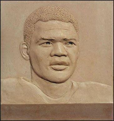 Flat sculpture of a football player