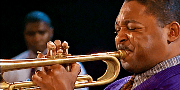 A close up shot of Wynton Marsalis playing the trumpet during the International Jazz Festival