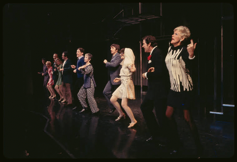 Animation of COMPANY cast dancing in a kick line