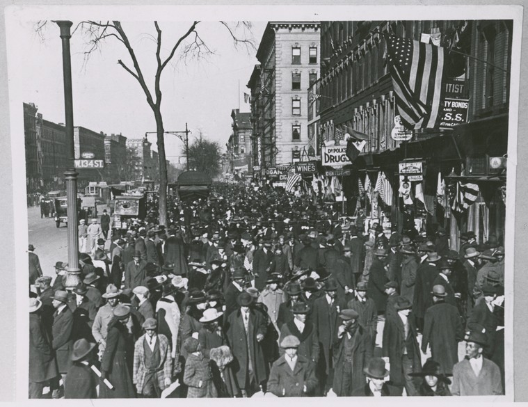 Crowded street view of Harlem 1919
