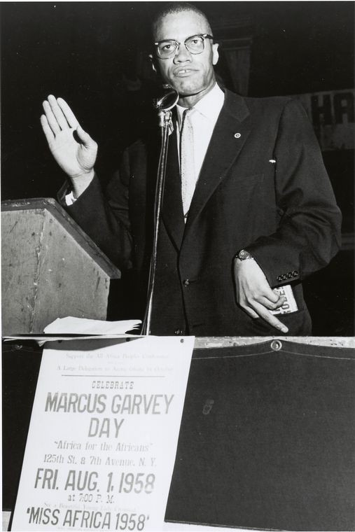 Malcolm X speaking at a Marcus Garvey Day Celebration