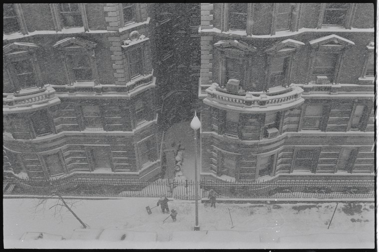 Snow fall on New York street as seen from above