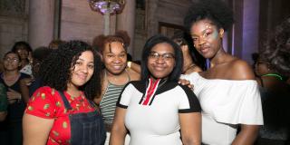 Photo from NYPL's Anti-Prom featuring teens smiling and posing for camera