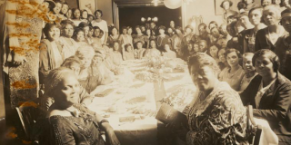 Black-and-white photograph of Mary McLeod Bethune, Ida B. Wells, Nannie Burroughs and other women at a Baptist women's gathering in Chicago in 1930.
