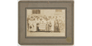 Photograph of Black women suffragists holding sign reading "Head-Quarters for Colored Women Voters," in Georgia