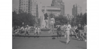 Historic photo of people hanging out in Washington Square Park
