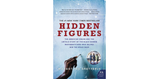 Book cover featuring a Black woman's hand writing on a blue chalkboard with the book title in red text above: Hidden Figures