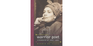 Book cover featuring a historic photo of poet Audre Lorde looking off into the distance with one hand on her cheek along with the book title at the bottom of the image: Warrior Poet A Biography of Audre Lorde