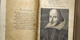 An open book showing a note to the reader on the left hand page and the title page featuring a portrait of Shakespeare on the right.