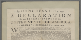 Printed document reading, across the top, “In Congress, July 4, 1776, A Declaration By Representatives of the United States of America, in General Congress Assembled,” with the name of John Hancock printed prominently at bottom right