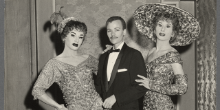 Black-and-white photograph of Stormé DeLarverié in a tuxedo and three drag performers.