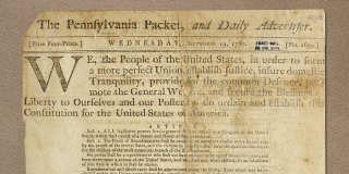 Printed document on tan, creased paper, with newspaper title and header followed by “We the People…”