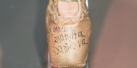 Pink pointe shoe signed “To Senia, a lovely dancer, Alexandra Danilova”