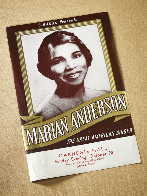 A flyer depicting a Black woman with a slight smile and the label "Marian Anderson: The Great American Singer"