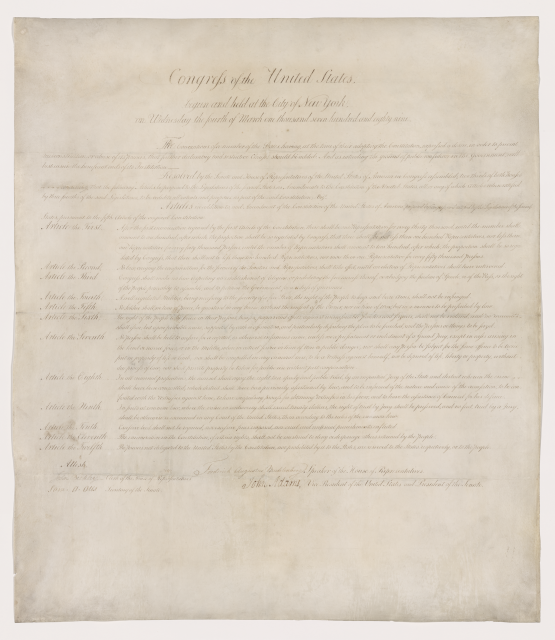 Handwritten copy of the Bill of Rights; slightly browned paper with faded text