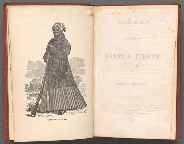 Book open to the title page opposite a black-and-white illustration of Harriet Tubman in a dress, coat, crossbody bag, and headscarf, holding a rifle with its handle against the ground