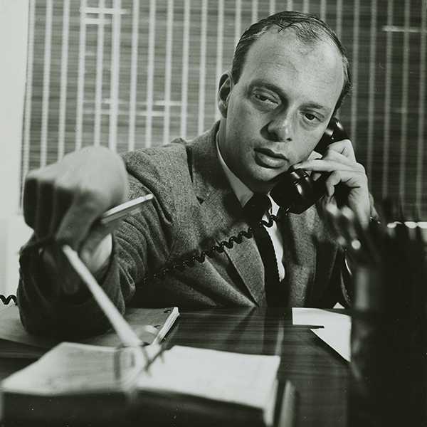 Harold Prince at his desk